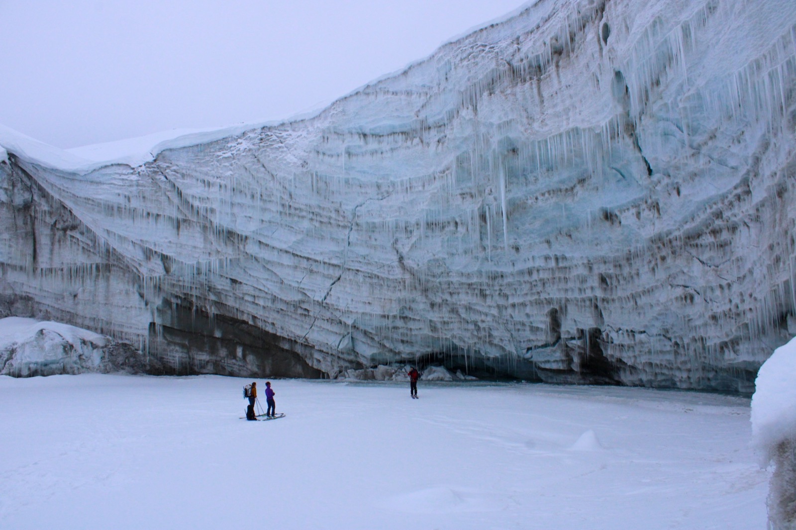 Inspecting the toe of the Des Poilus Glacier.