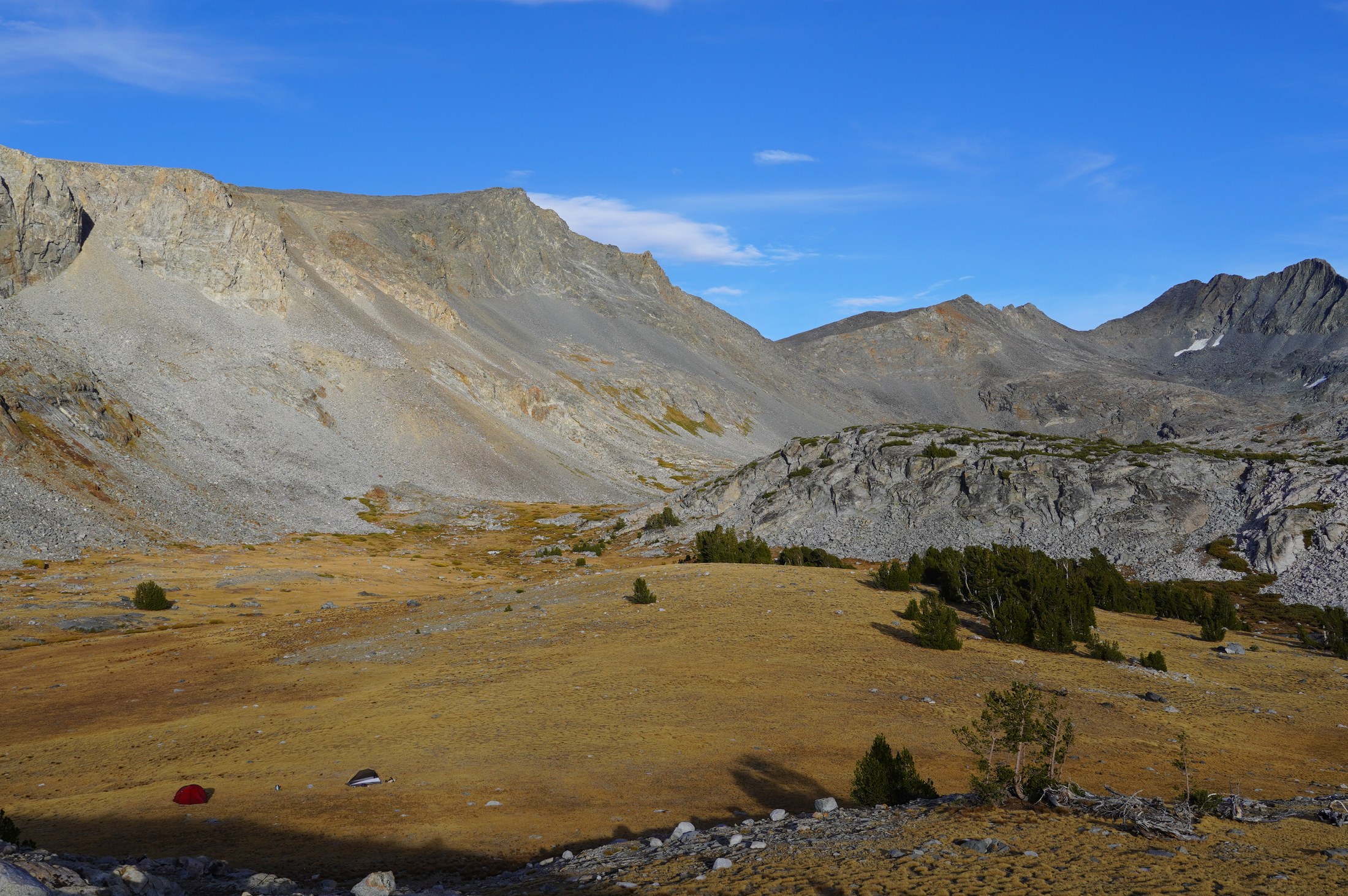 Evening light on the meadow and granite above camp
